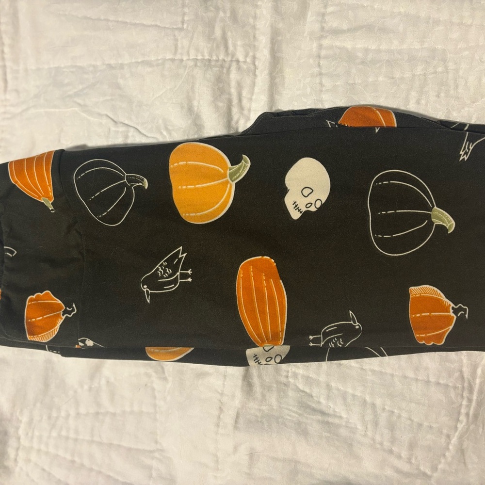 LuLaRoe Black Leggings with Orange Pumpkins and White Skulls